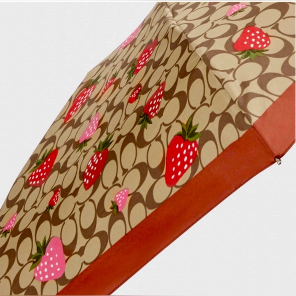 Coach Mini Umbrella In Signature Wild
Strawberry Print. UV Protection CI017. NWT - Picture 4 of 6